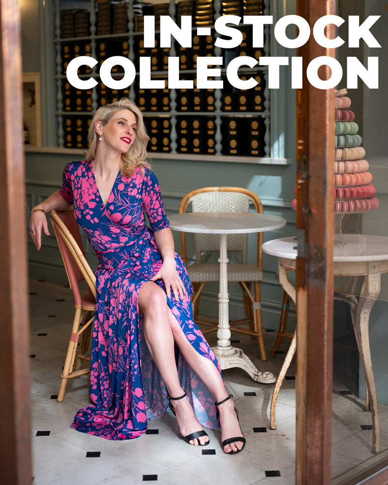 By Samantha Melbourne in-stock collection cover.  Model wears navy and pink floral maxi wrap dress with 3/4 sleeve