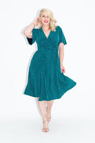 flutter sleeve Sparkly Wrap dress in green with is available in regular and plus size dress options